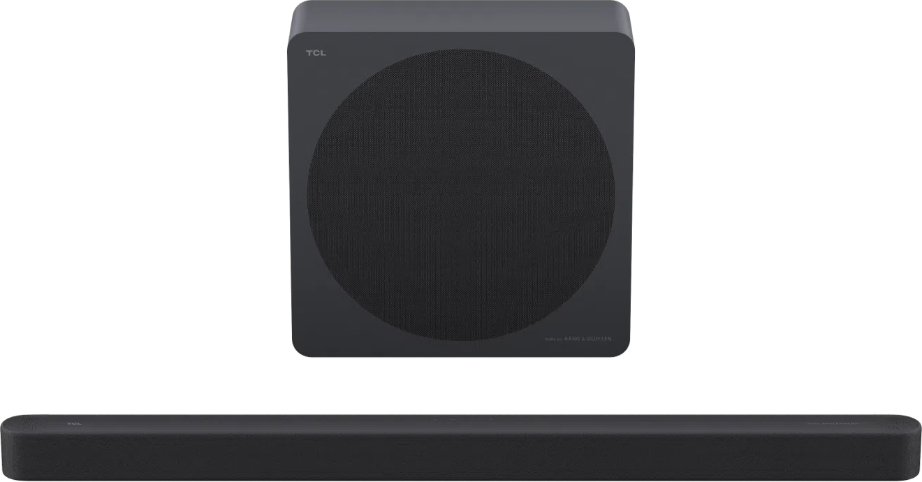 Ein grauer TCL Soundbar mit Subwoofer auf schwarzem Hintergrund.