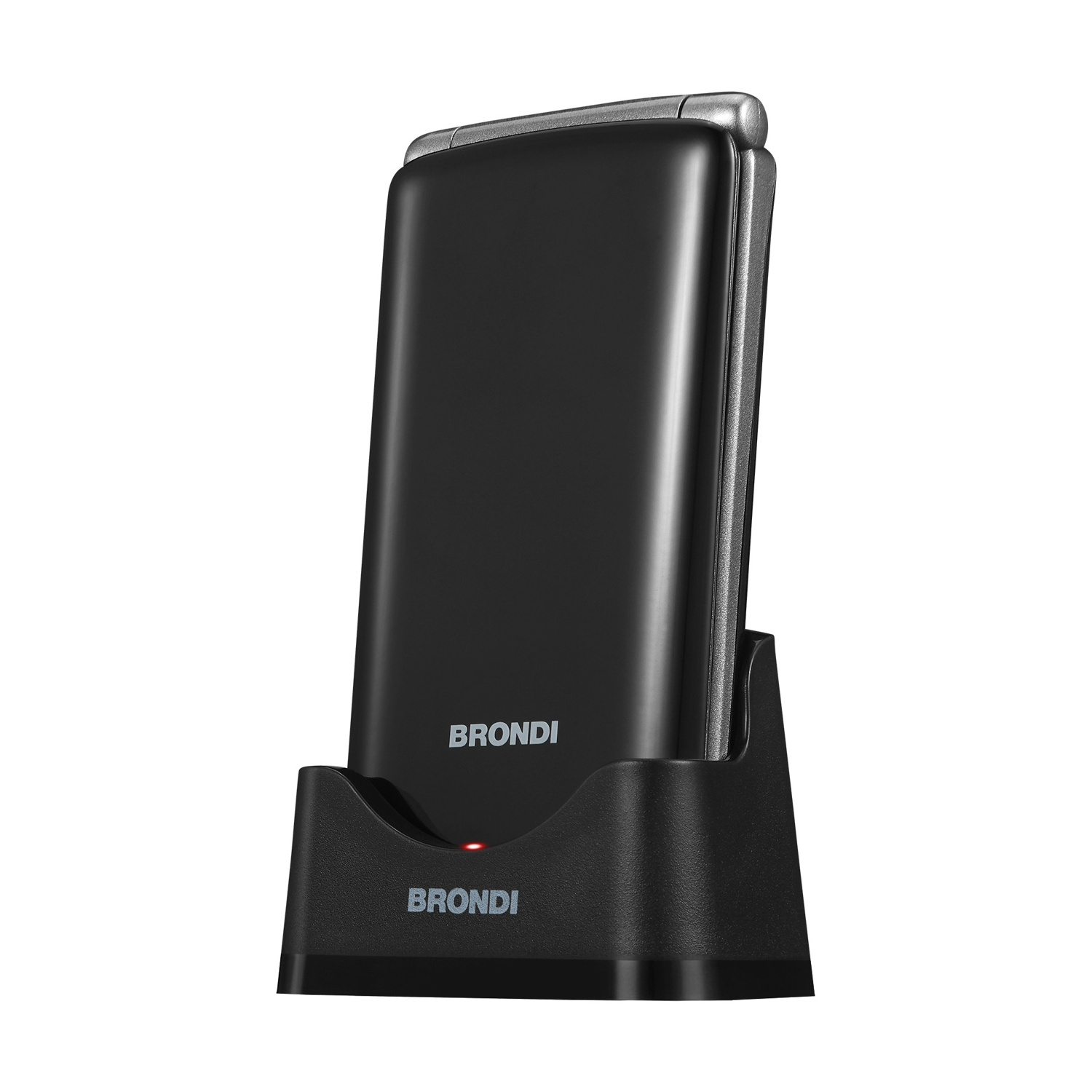 Un cellulare a conchiglia Brondi nero chiuso inserito nella base di ricarica, sfondo bianco.