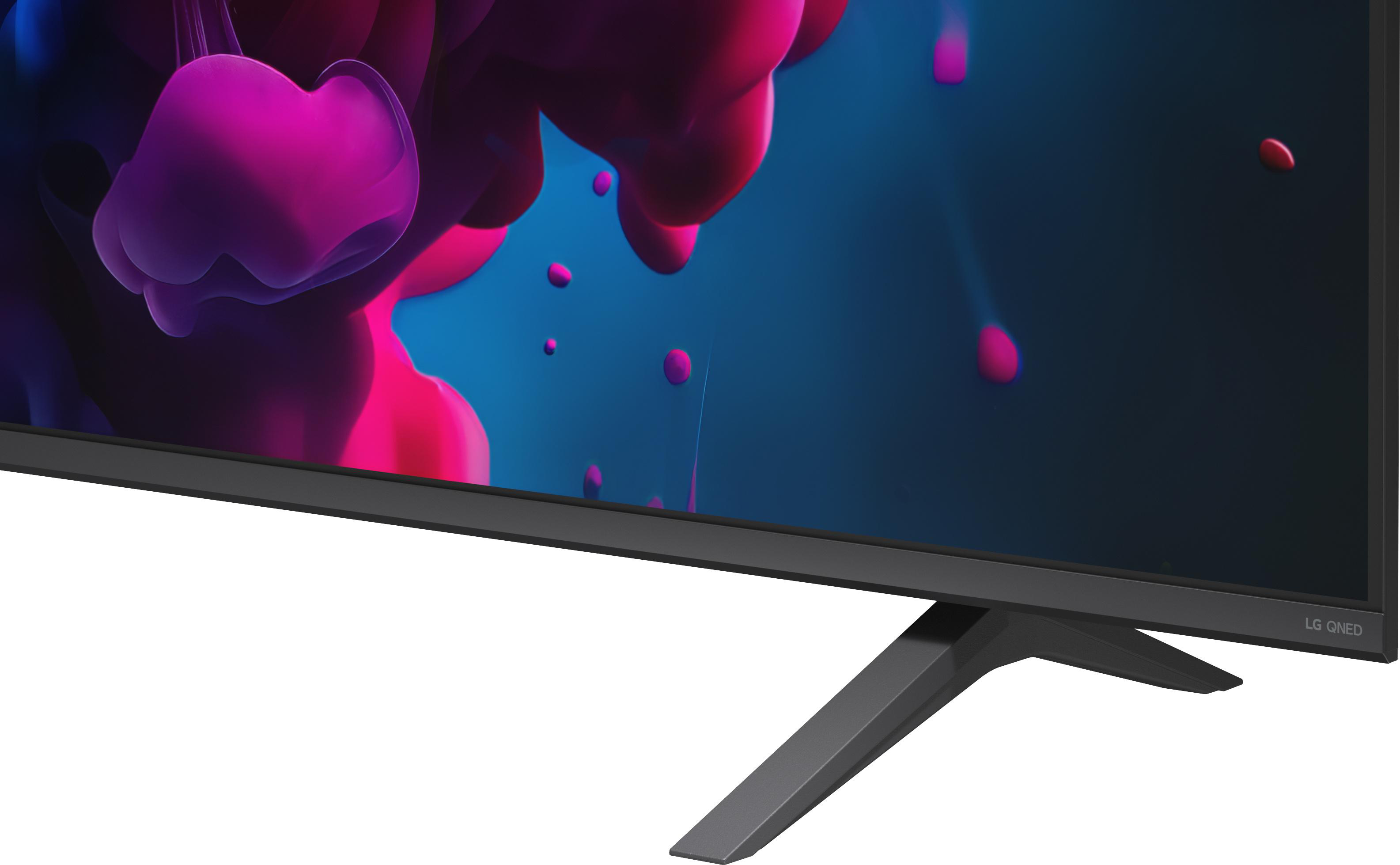 Unterer Teil eines LG QNED Fernsehers mit modernem schwarzen Standfuss und buntem Bildschirm.