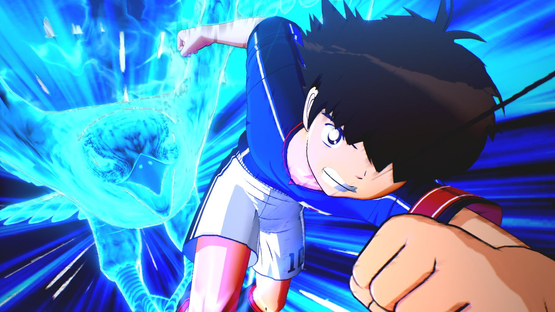 Ein Anime-Fußballspieler in blauem Trikot läuft mit einer leuchtend blauen Adler-Aura nach vorne.