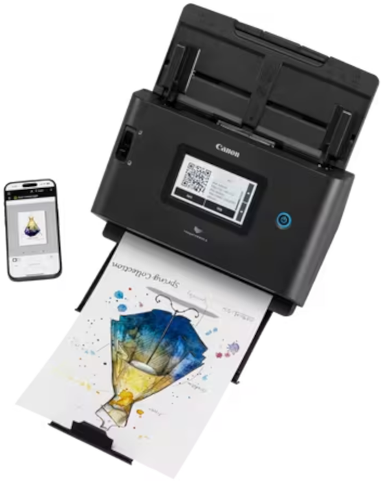 Uno scanner Canon nero scansiona un documento con un disegno colorato, con uno smartphone alla sua sinistra.