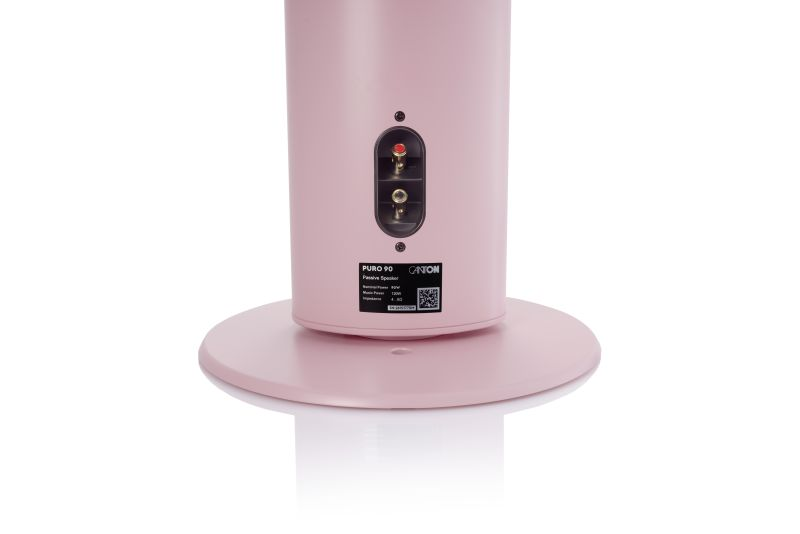 Die Rückseite eines rosa Canton Puro 90 Standlautsprechers mit Anschlüssen und Etikett.