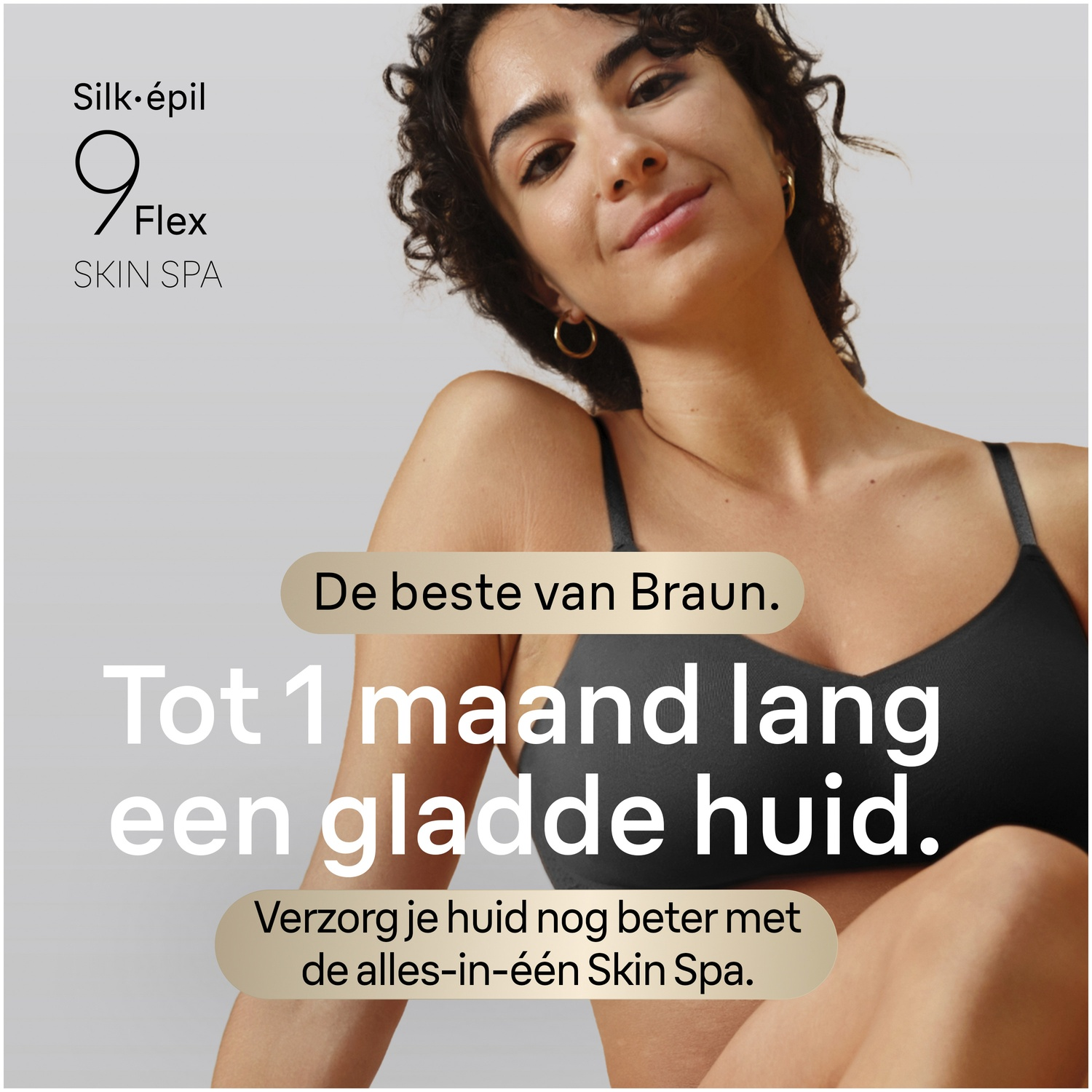A woman with dark curly hair smiles against a grey background, accompanied by text for the Braun Silk-épil 9 Flex Skin Spa.