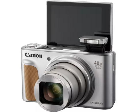 Srebrny aparat kompaktowy Canon SX740 HS z odchylanym ekranem i lampą.