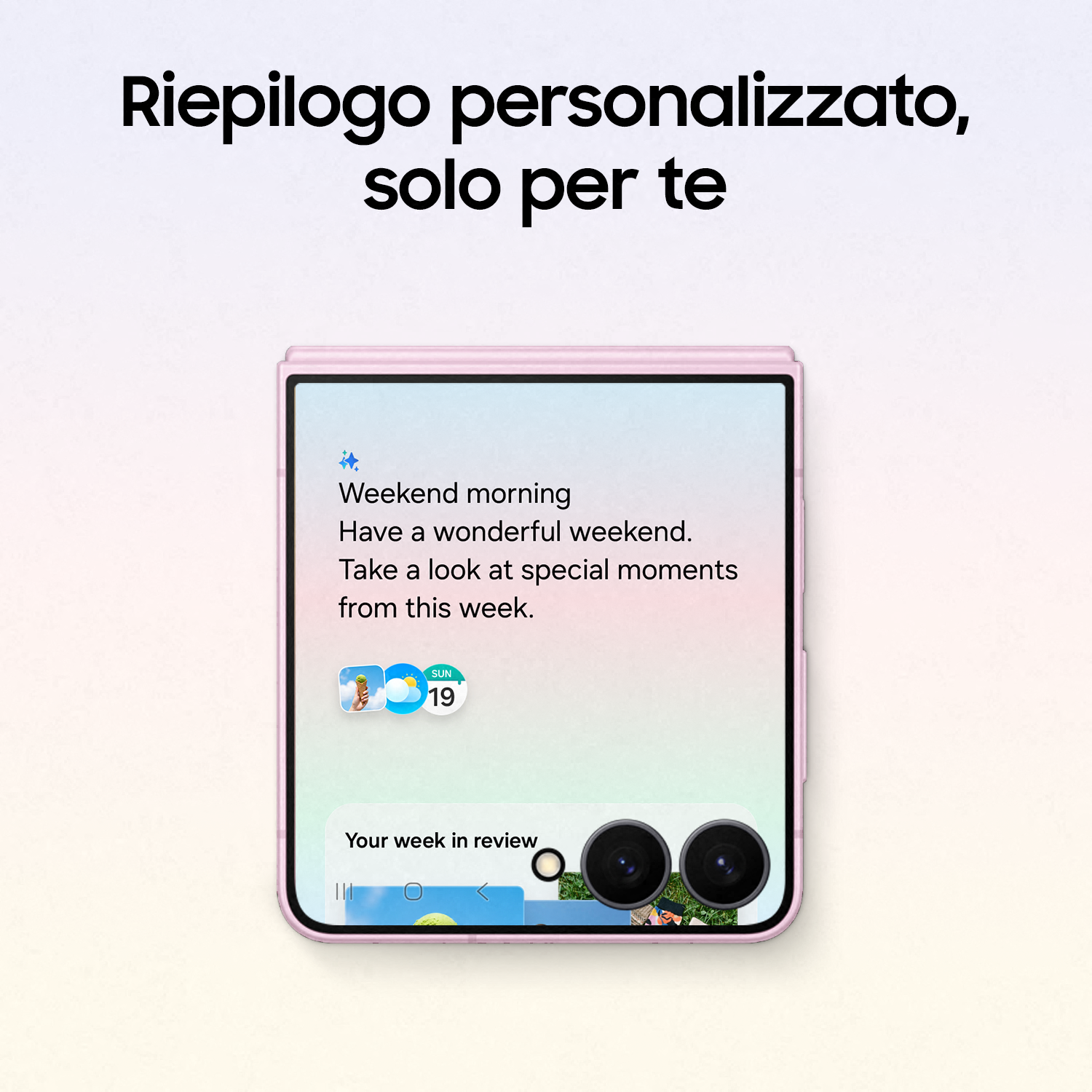 Uno smartphone pieghevole rosa che mostra una schermata di saluto mattutino personalizzata.