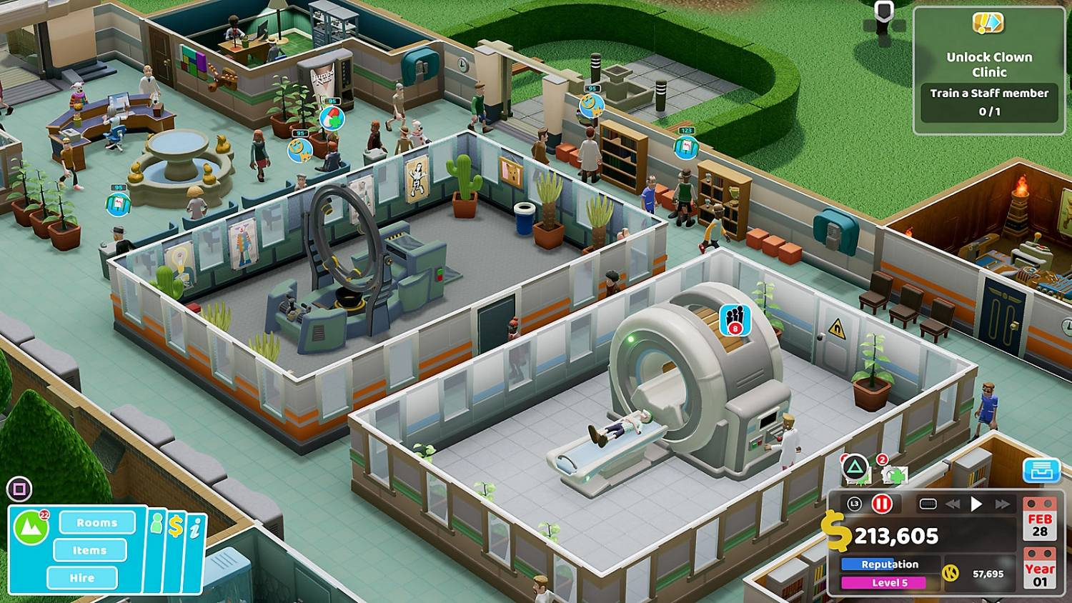 Vista superior de un juego de simulación de hospital con pacientes, equipo médico y habitaciones.