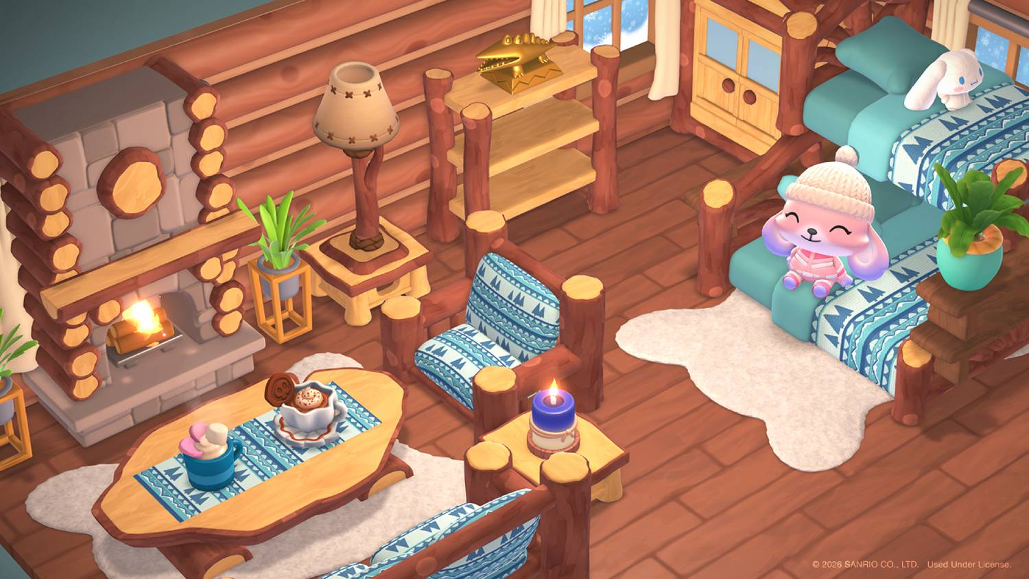 Acogedor interior de cabaña con chimenea de piedra iluminada, literas, cojines azules con patrones y un peluche.