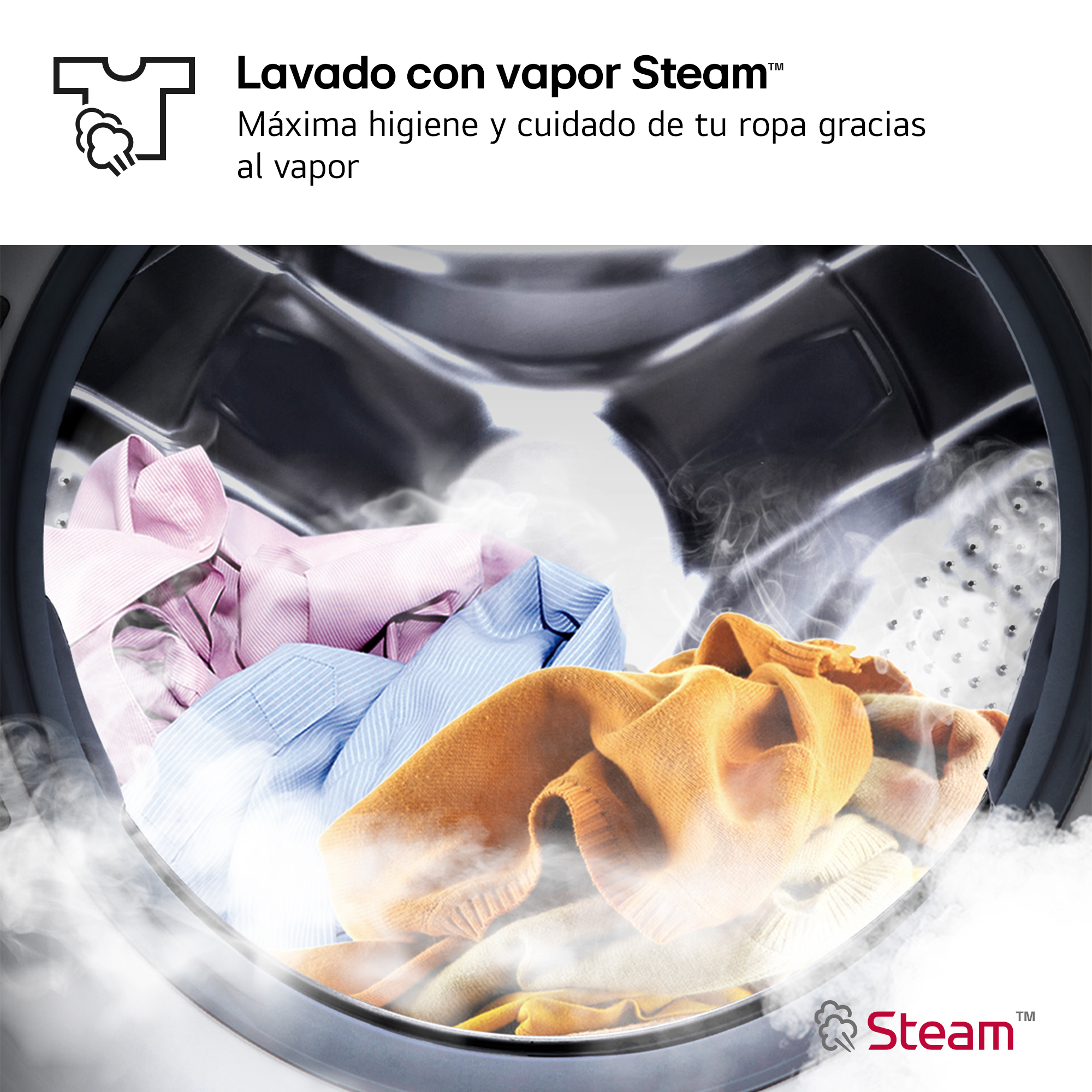 Vista interior del tambor de una lavadora con ropa de color y vapor.