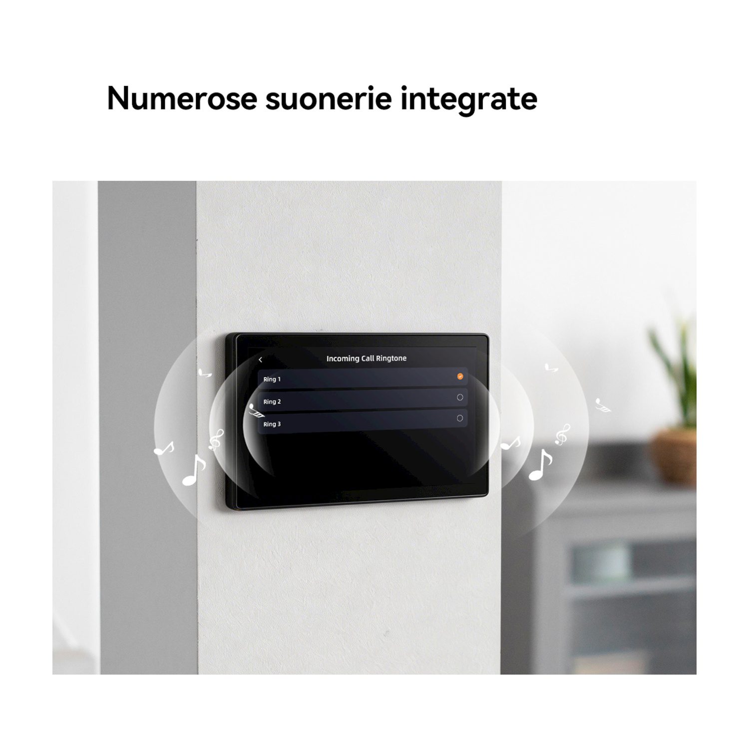 Schermo a muro che mostra suonerie con note musicali intorno.