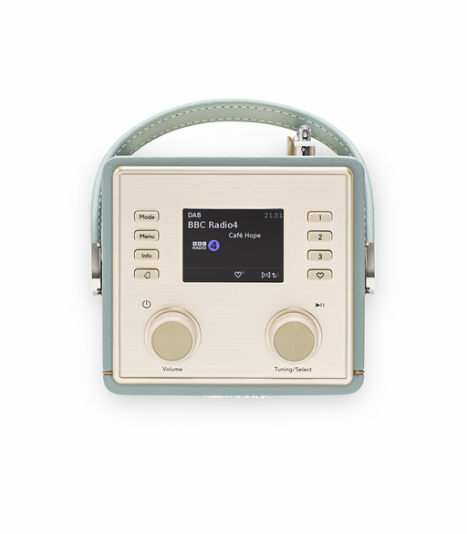 Ein mintgrünes und goldenes tragbares DAB-Radio mit Ledergriff, Digitaldisplay und zwei Drehknöpfen.