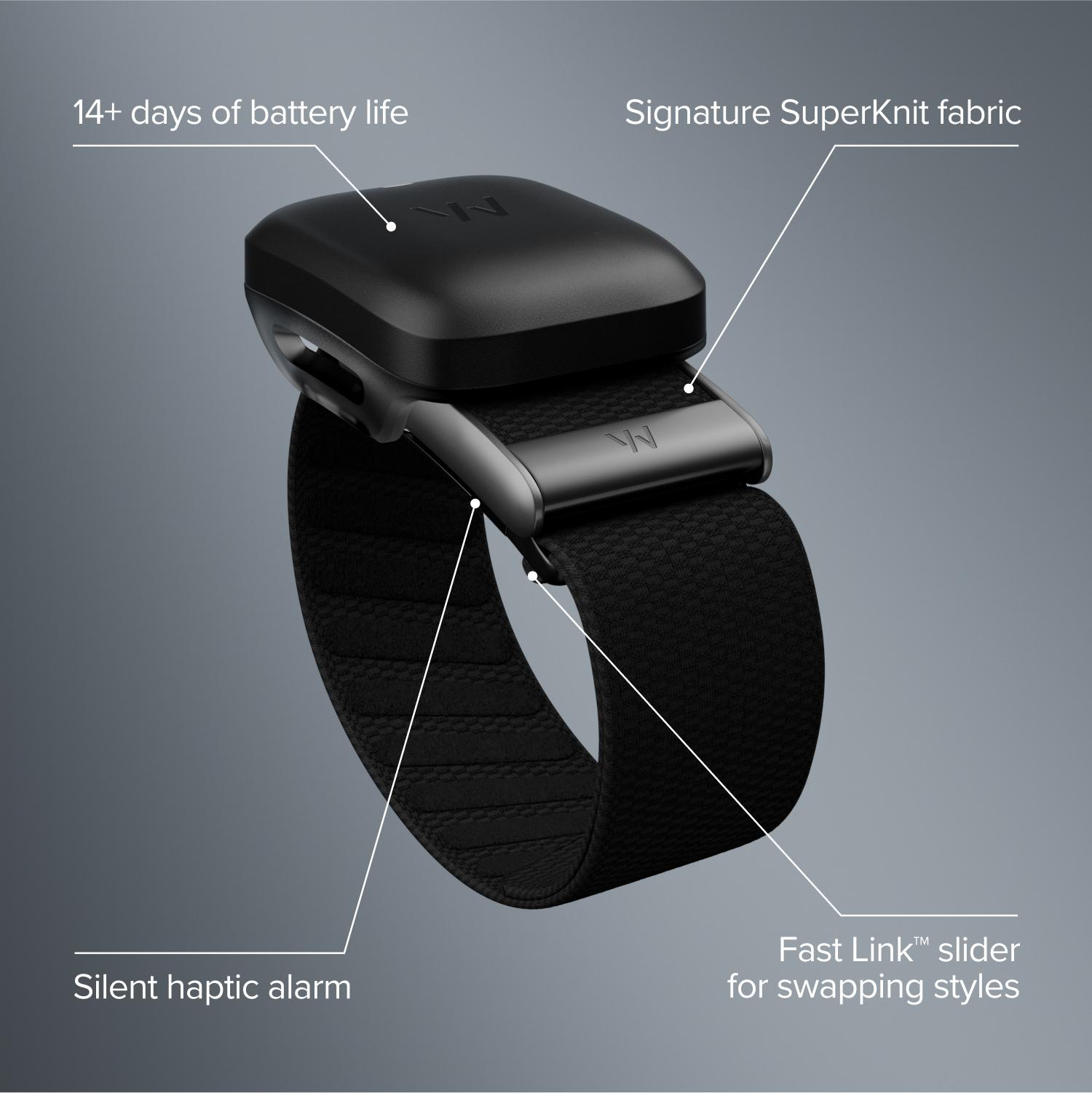 Schwarzes Fitnessarmband mit Batterie, Stoffarmband, Alarm und Schieber auf grauem Hintergrund.