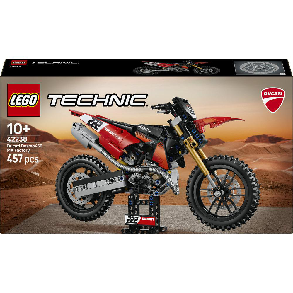 Lego Technic Ducati Desmo450 MX Factory Modell vor einer sandigen Wüstenlandschaft.