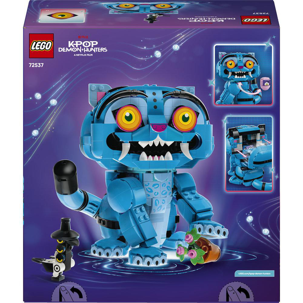 Die Box zeigt einen baubaren blauen Lego-Tiger mit gelben Augen und einer kleinen Minifigur vor einem nächtlichen Himmel.