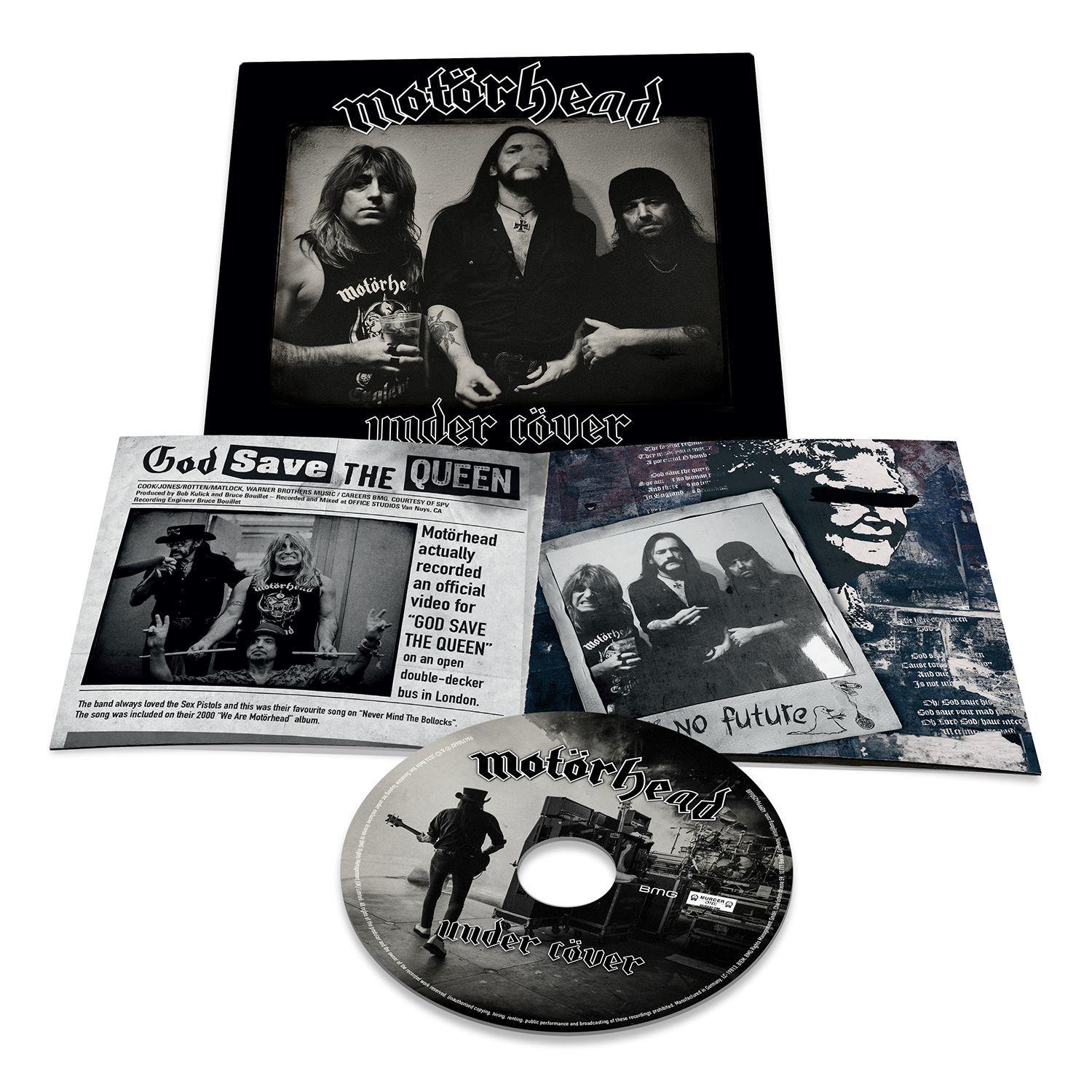 Das Bild zeigt die Motörhead 'Under Cover' CD mit Cover, Inlay und bedruckter Disc vor schwarzem Hintergrund.