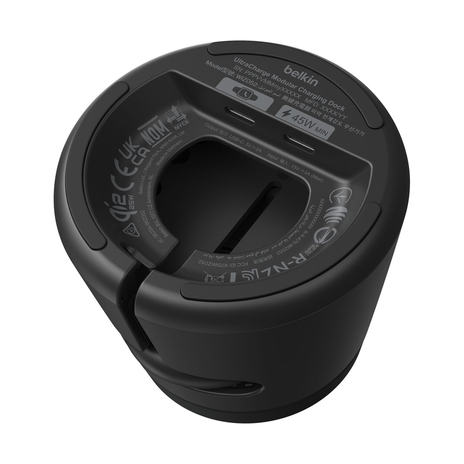 Il fondo di una base di ricarica modulare Belkin UltraCharge nera con specifiche tecniche.