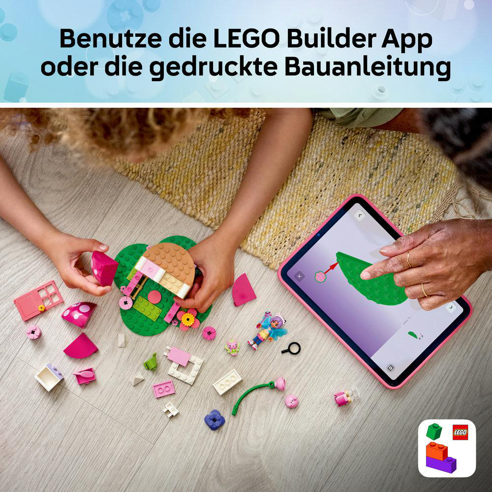 Kinder bauen mit LEGO Steinen, unterstützt von einer Tablet-App mit digitaler Bauanleitung.