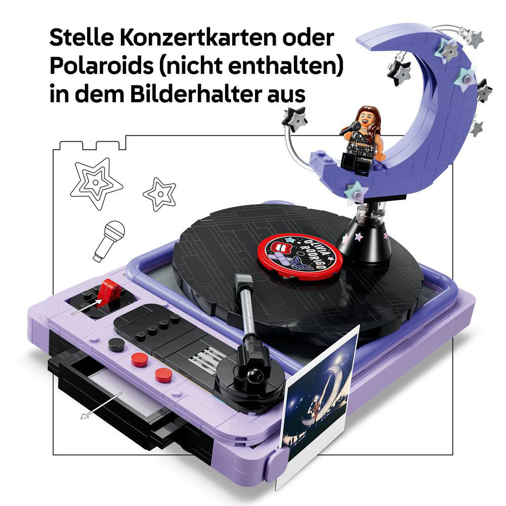 Lego-Plattenspieler in Lila mit Plattenstapel und kleiner Mondfigur.