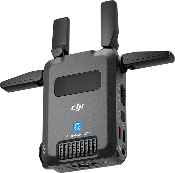 Fekete DJI SDR Transmission adó négy antennával és portokkal fekete háttér előtt.
