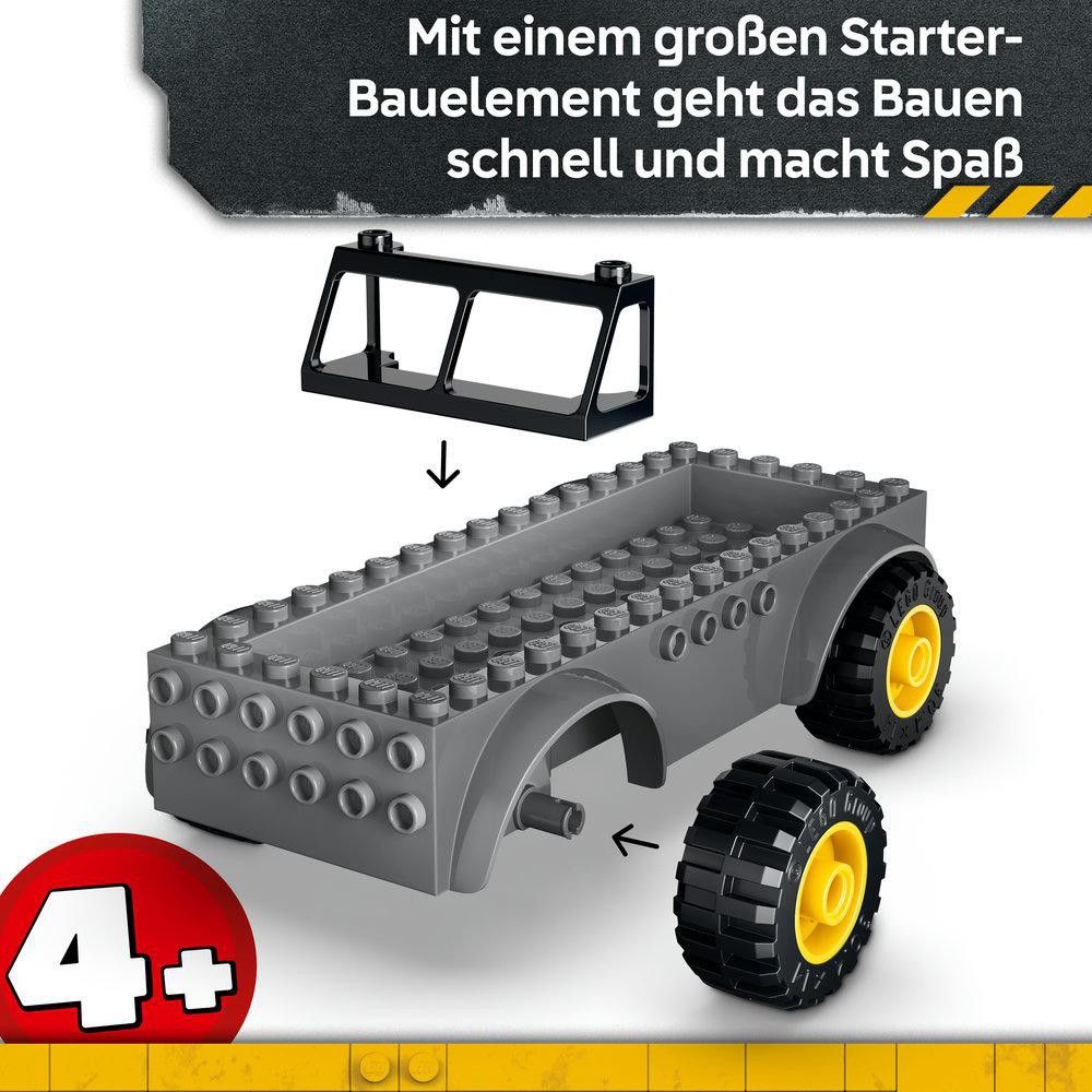 Graues Lego-Chassis mit gelben Rädern, einer schwarzen Frontscheibe und deutschem Text oben.