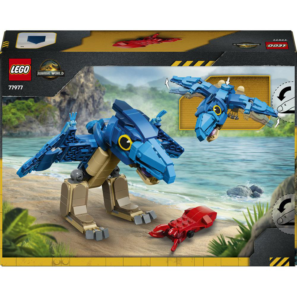 Lego Jurassic World Kasten mit blauen Pteranodon-Dinosaurier und rotem Insekt am Strand.
