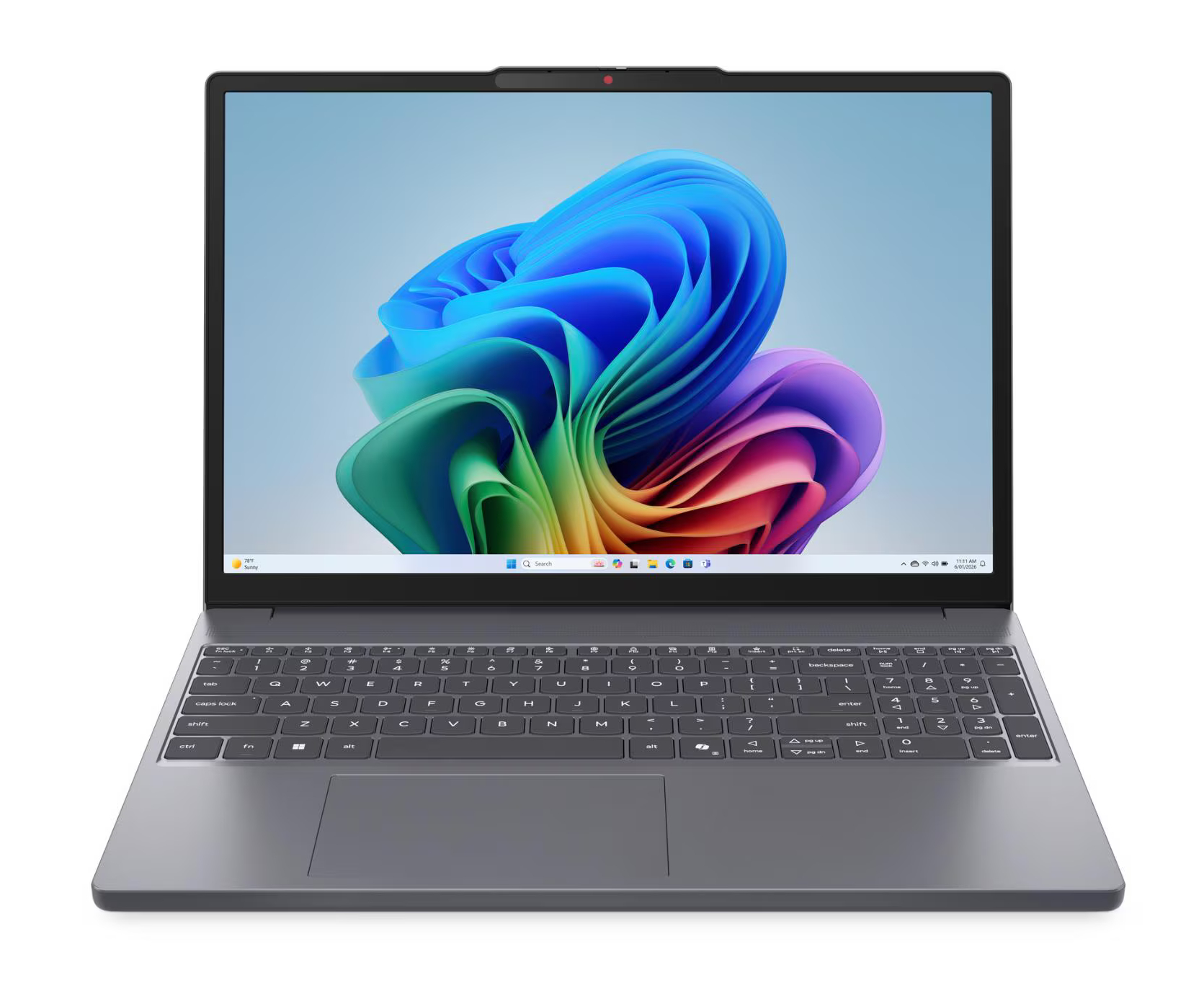 Szary laptop z kolorową, abstrakcyjną grafiką przedstawiającą kwiat jako tapetę na ekranie.