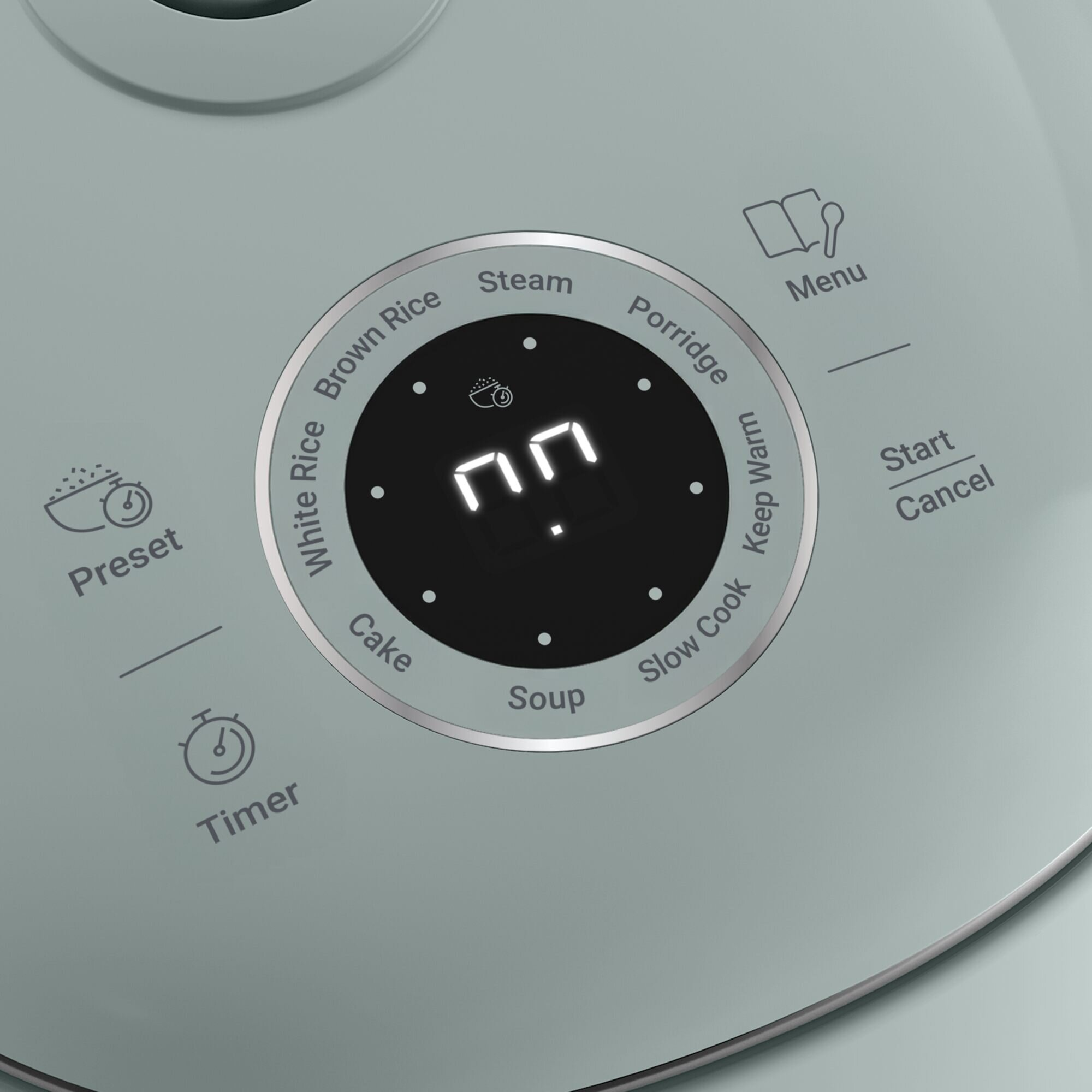 Panel sterowania ryżowaru z cyfrowym wyświetlaczem i opcjami takimi jak White Rice, Steam i Porridge.