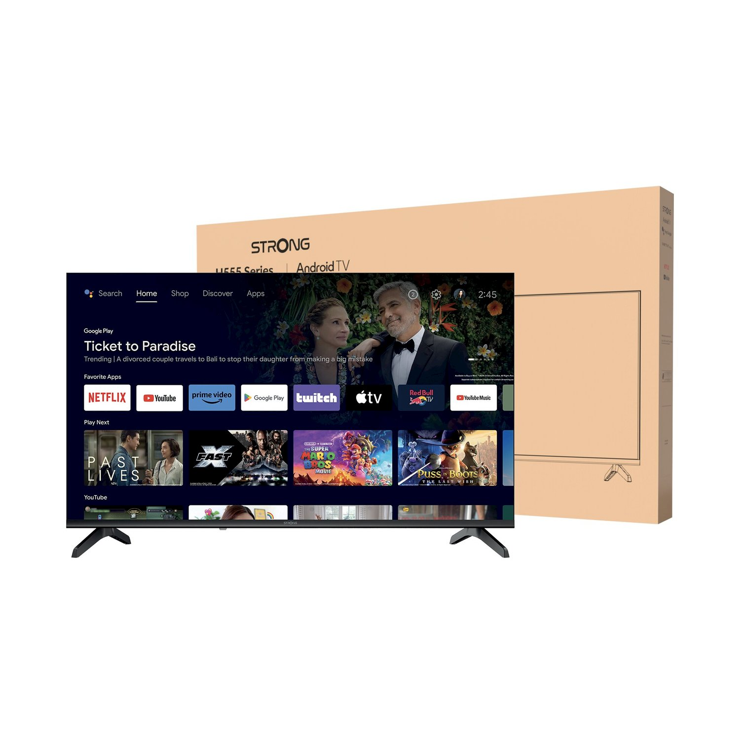 Una TV Android Strong mostra la schermata iniziale con app e la scatola di cartone dietro.