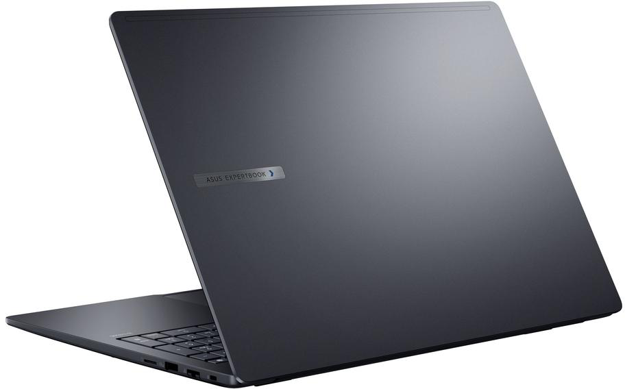 Zárt, sötétszürke Asus ExpertBook laptop világos háttér előtt.