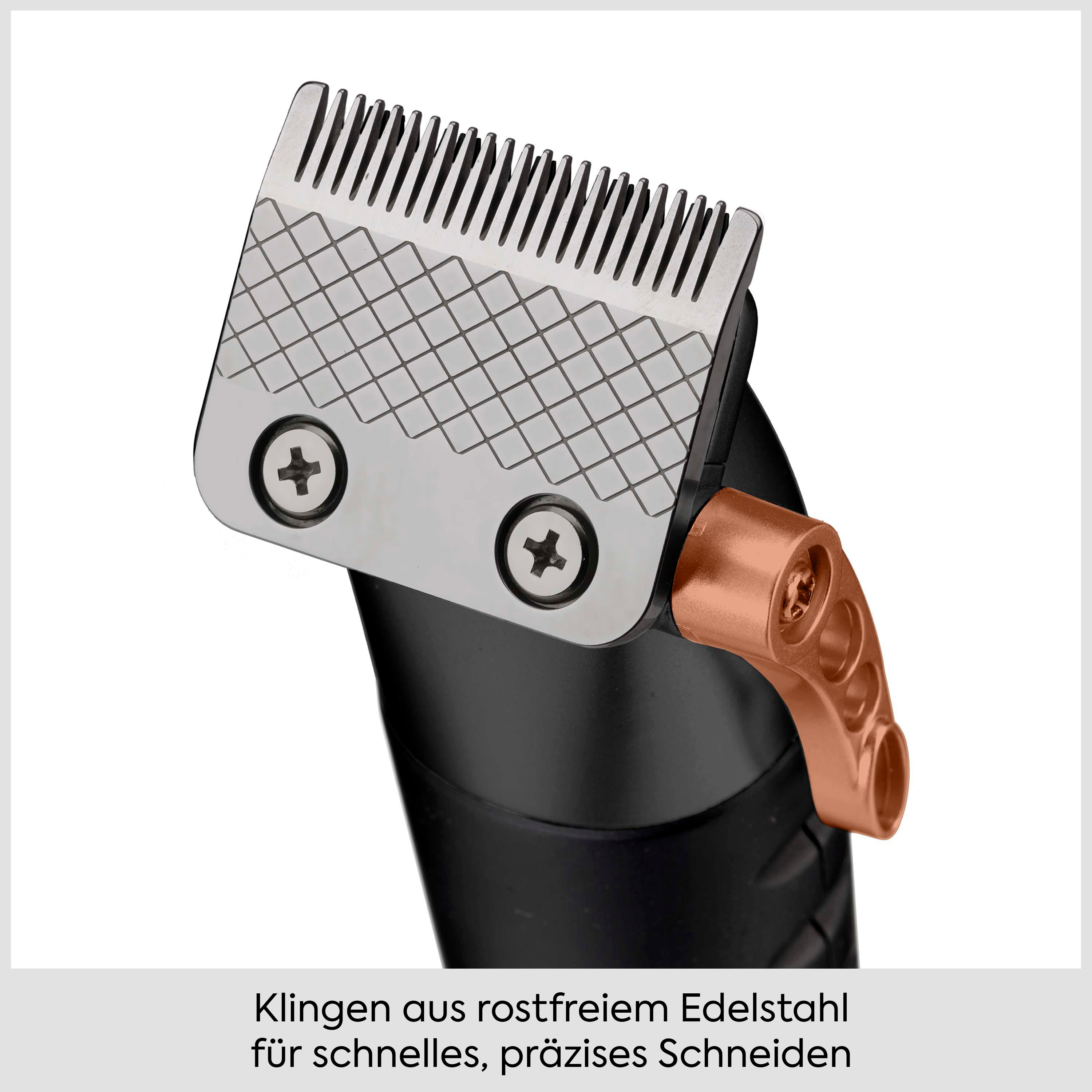 Nahaufnahme eines Haarschneidemaschinenkopfs mit Edelstahldraht und kupferfarbenem Hebel.