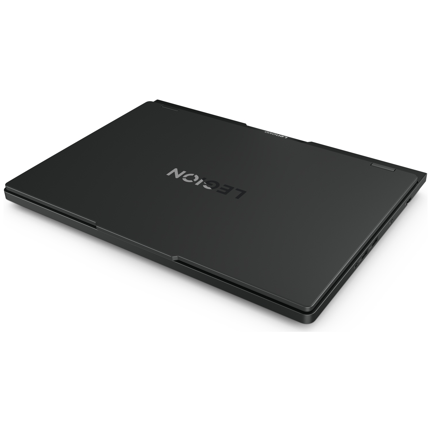 Ordinateur portable Lenovo Legion noir fermé sur fond blanc avec logo visible.