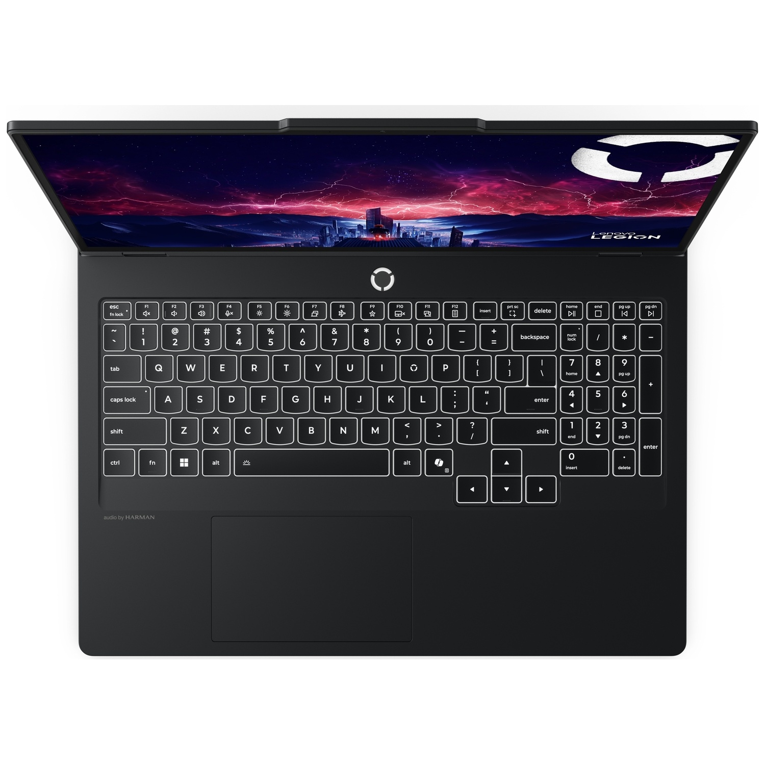 Vue de dessus d'un ordinateur portable noir avec clavier rétroéclairé et écran affichant un paysage urbain futuriste.