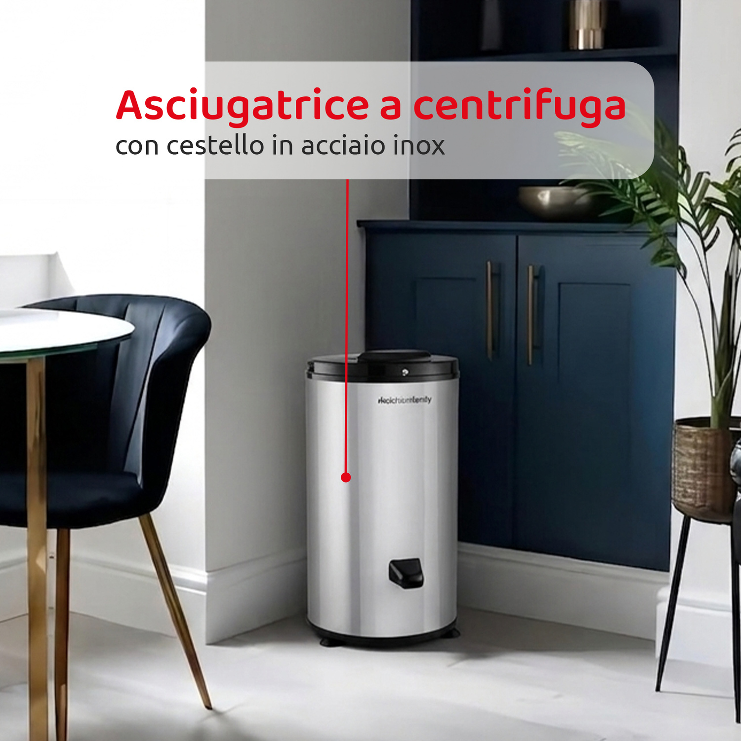 Un'asciugatrice centrifuga con cestello in acciaio inox si trova in una stanza moderna con mobili blu e una sedia.