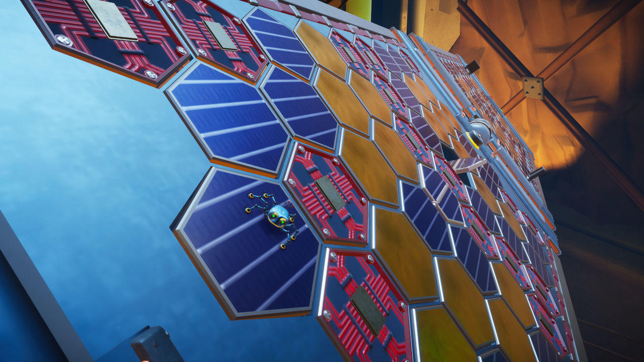 Eine futuristische Wand aus gelben, blauen und roten Hexagonelementen mit einer kleinen blauen Roboterassel.