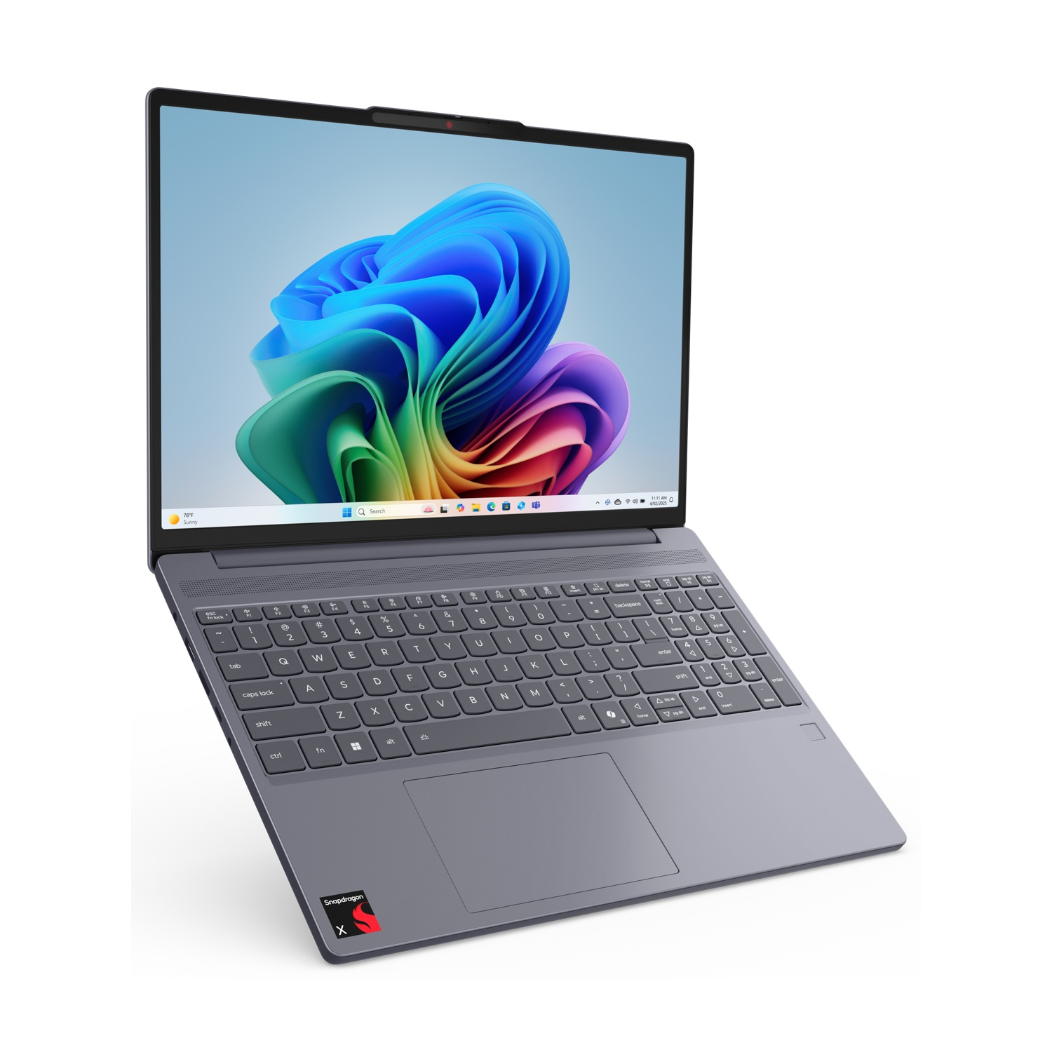 Laptop grigio con uno sfondo astratto colorato sullo schermo e una tastiera con tastierino numerico.