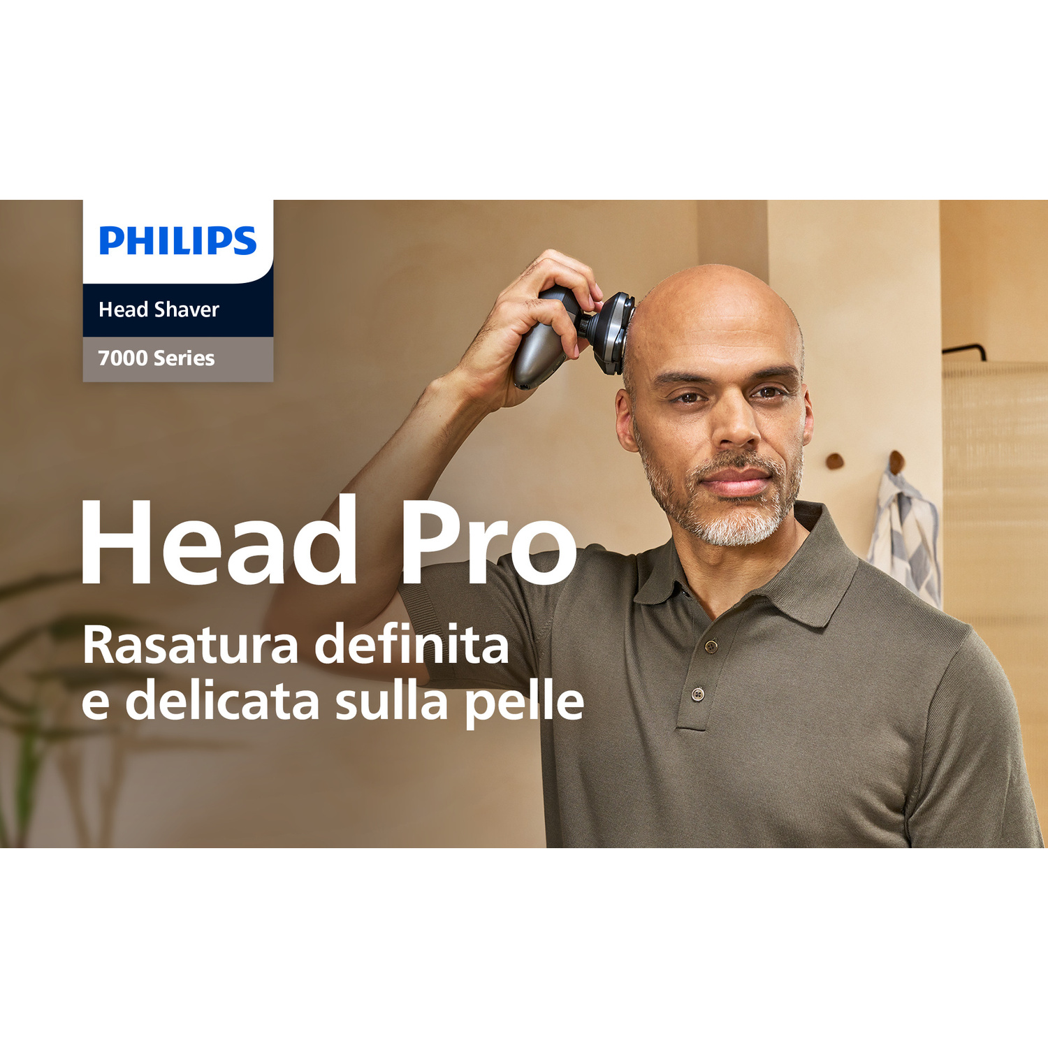 Un uomo usa un rasoio Philips sulla testa, con testo in primo piano e sfondo luminoso.