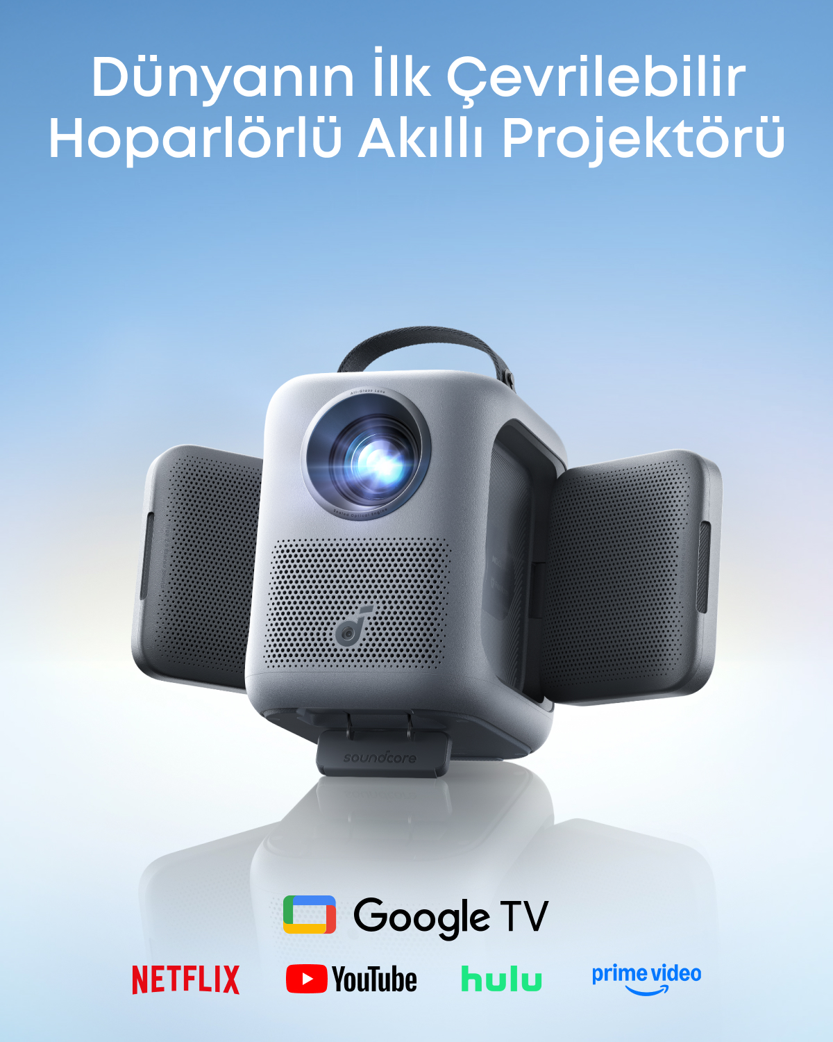 Açık arka planda dahili hoparlörlere ve yayın hizmeti logolarına sahip gri projektör.
