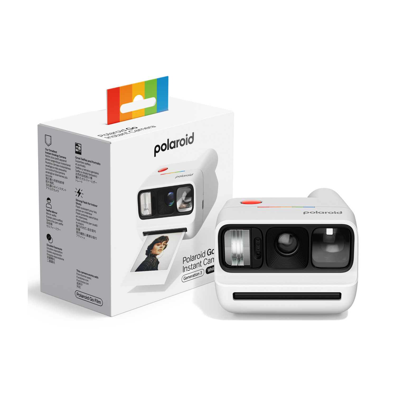 Una fotocamera istantanea Polaroid Go bianca accanto alla sua scatola e a una foto.