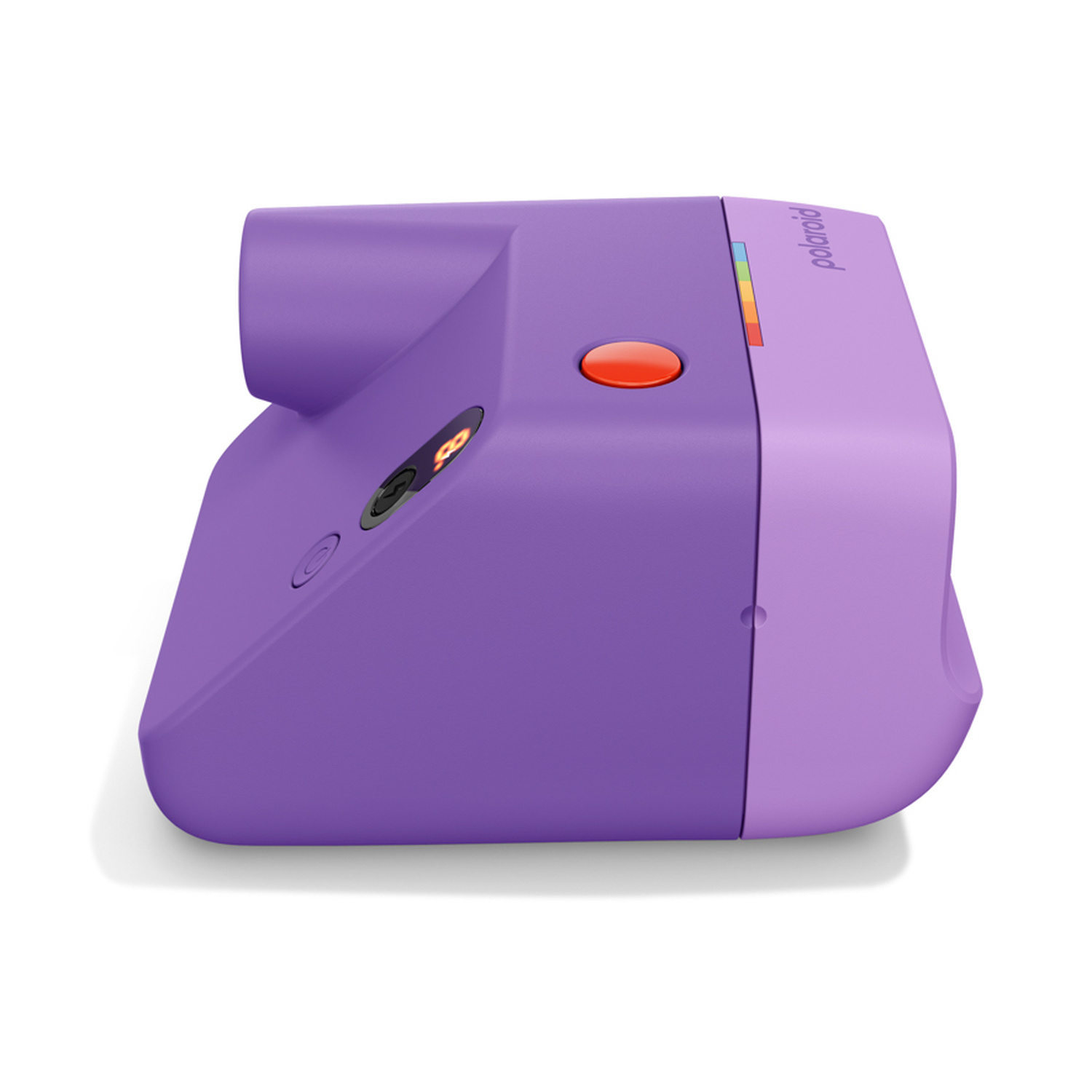 Una fotocamera istantanea Polaroid viola con pulsante rosso su sfondo bianco.