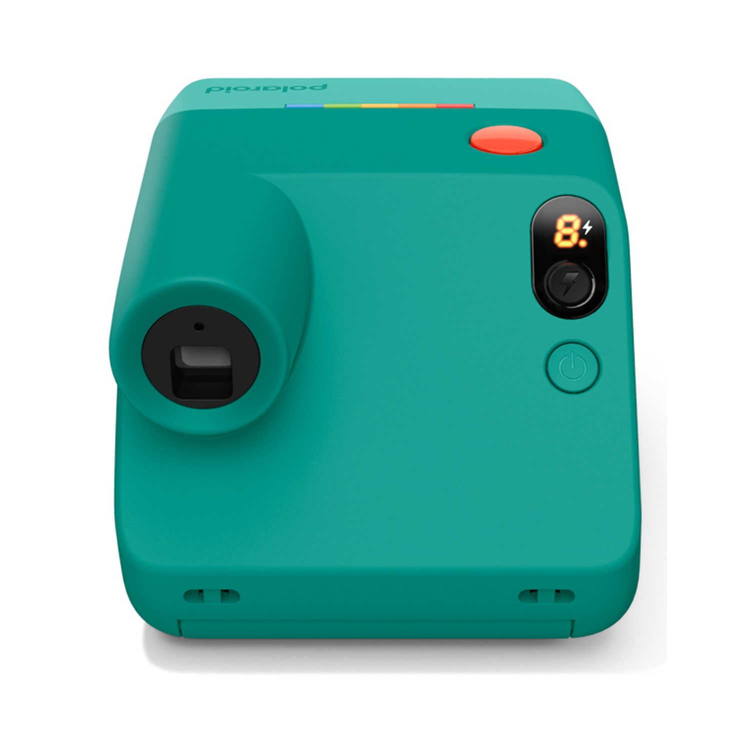 Una fotocamera istantanea verde acqua con pulsante di scatto rosso, obiettivo nero e display digitale su sfondo bianco.