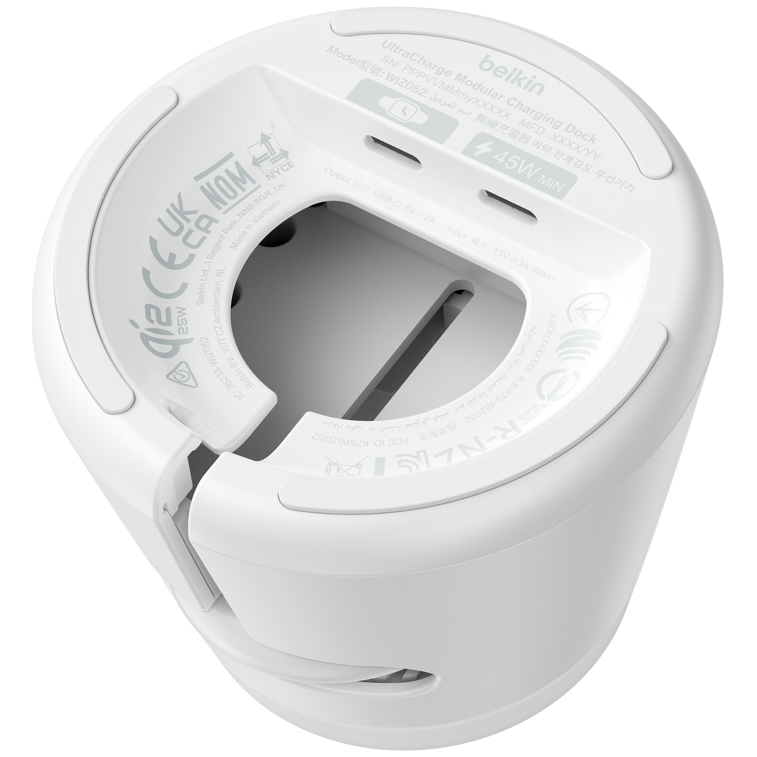 Vue de dessous d'un dock de charge modulaire Belkin UltraCharge blanc, affichant du texte et des logos.