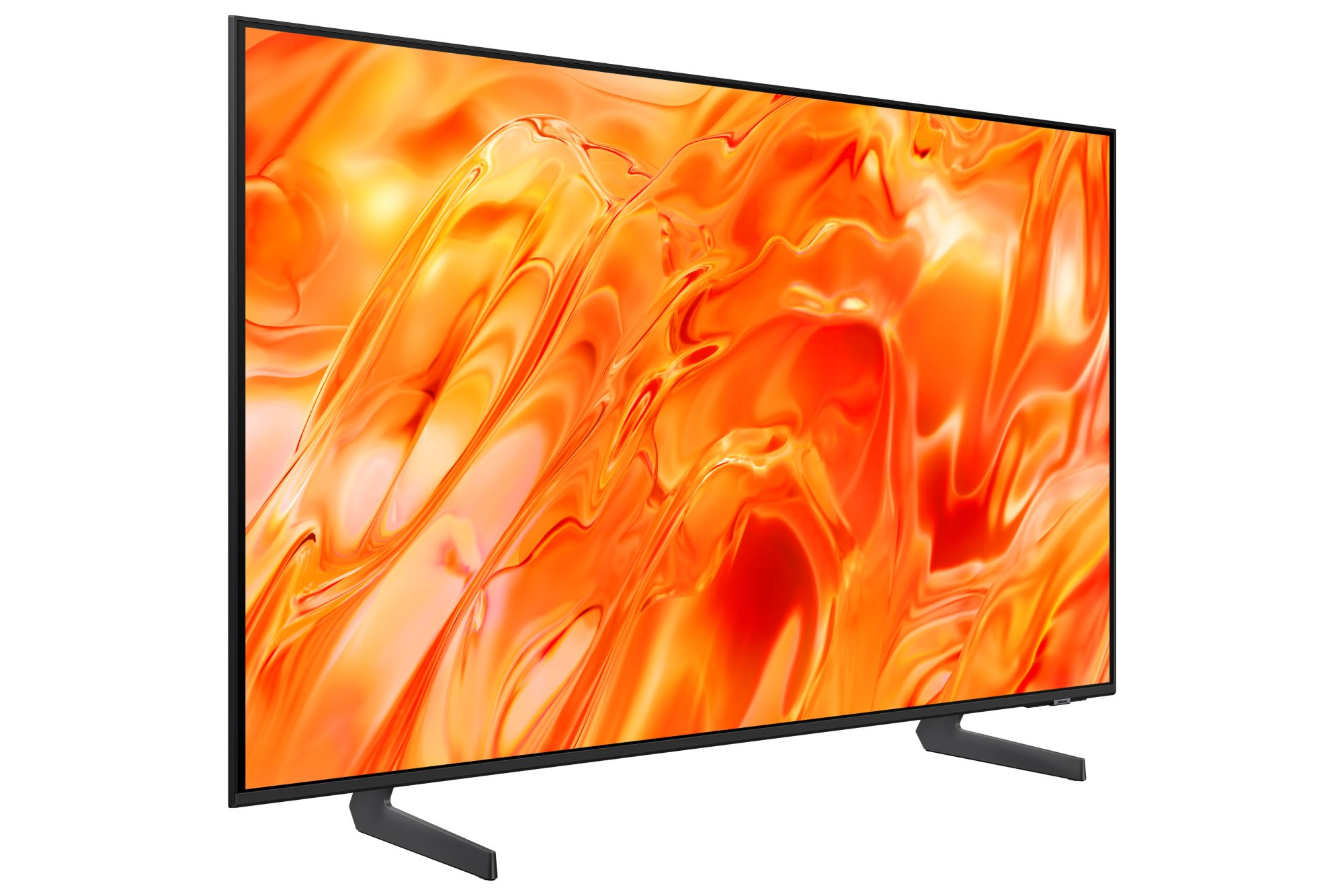 Un televisor elegante con marco negro sobre dos patas muestra un patrón abstracto de color naranja brillante.