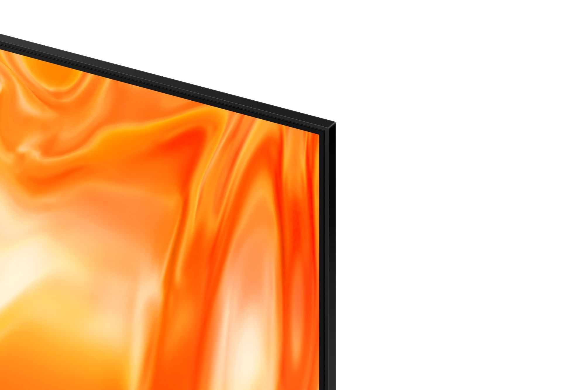 Primer plano de la esquina de un televisor negro que muestra una pantalla naranja vibrante sobre fondo blanco.