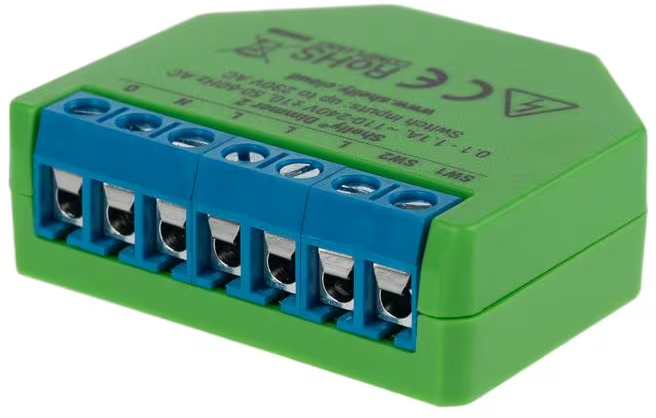 Module de variateur Shelly vert avec des bornes à vis bleues sur fond blanc.