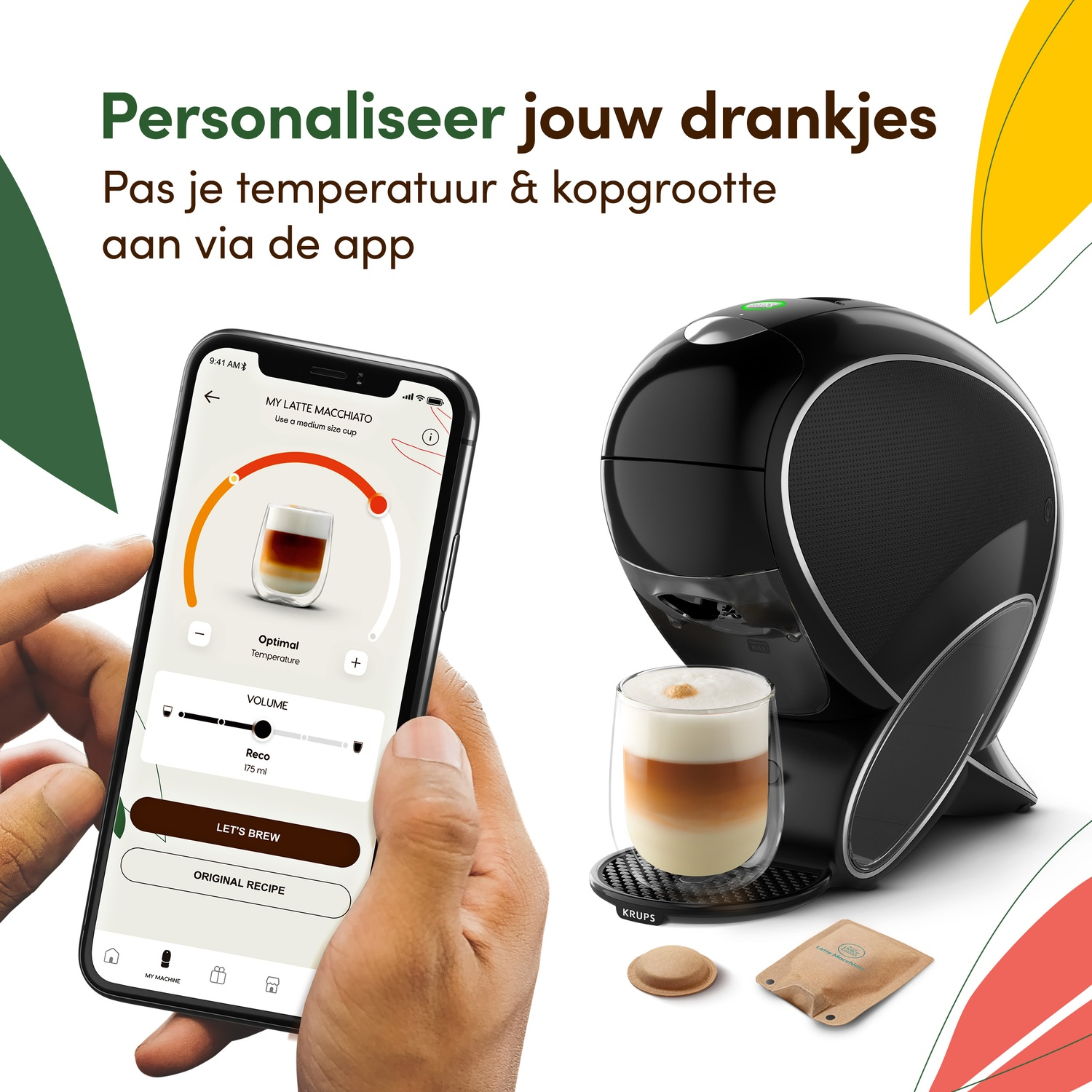 A hand holds a smartphone showing a coffee control app next to a Krups coffee machine with a latte macchiato.