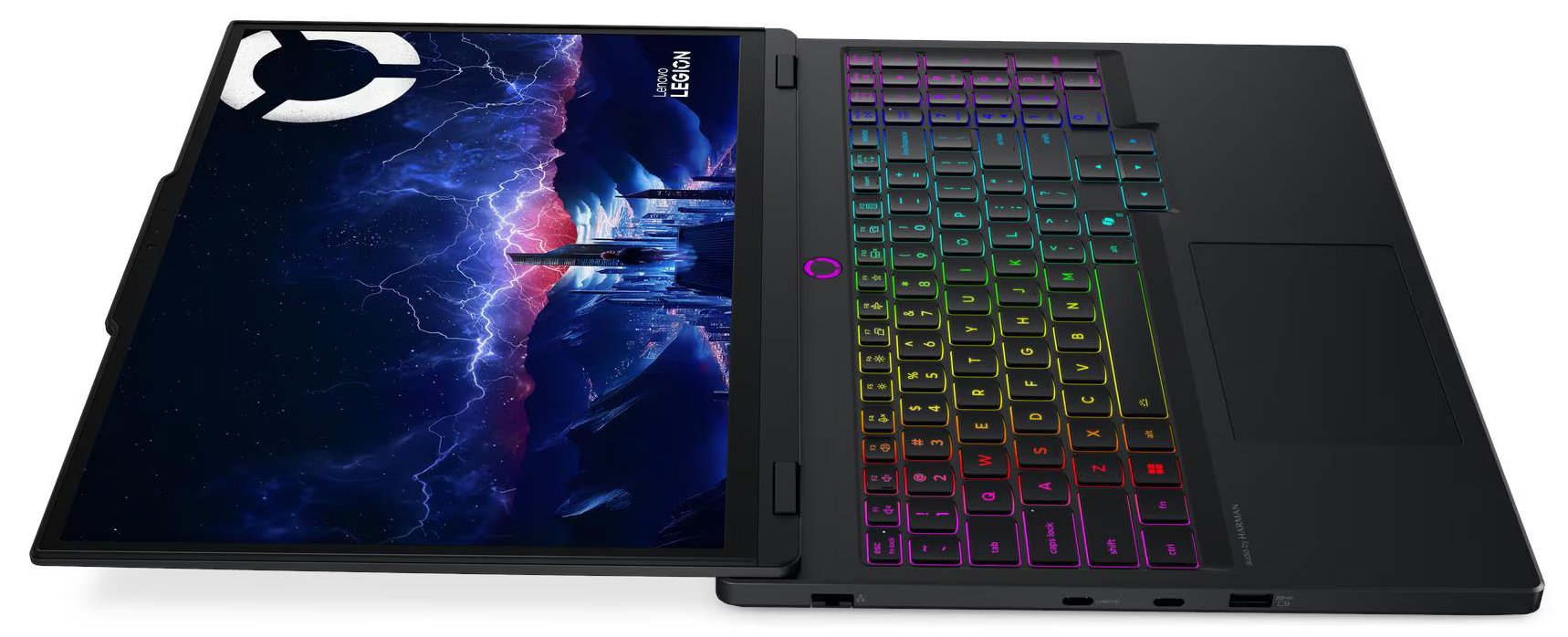 Fekete Lenovo Legion gamer laptop RGB háttérvilágítású billentyűzettel és lila villámos háttérképpel.