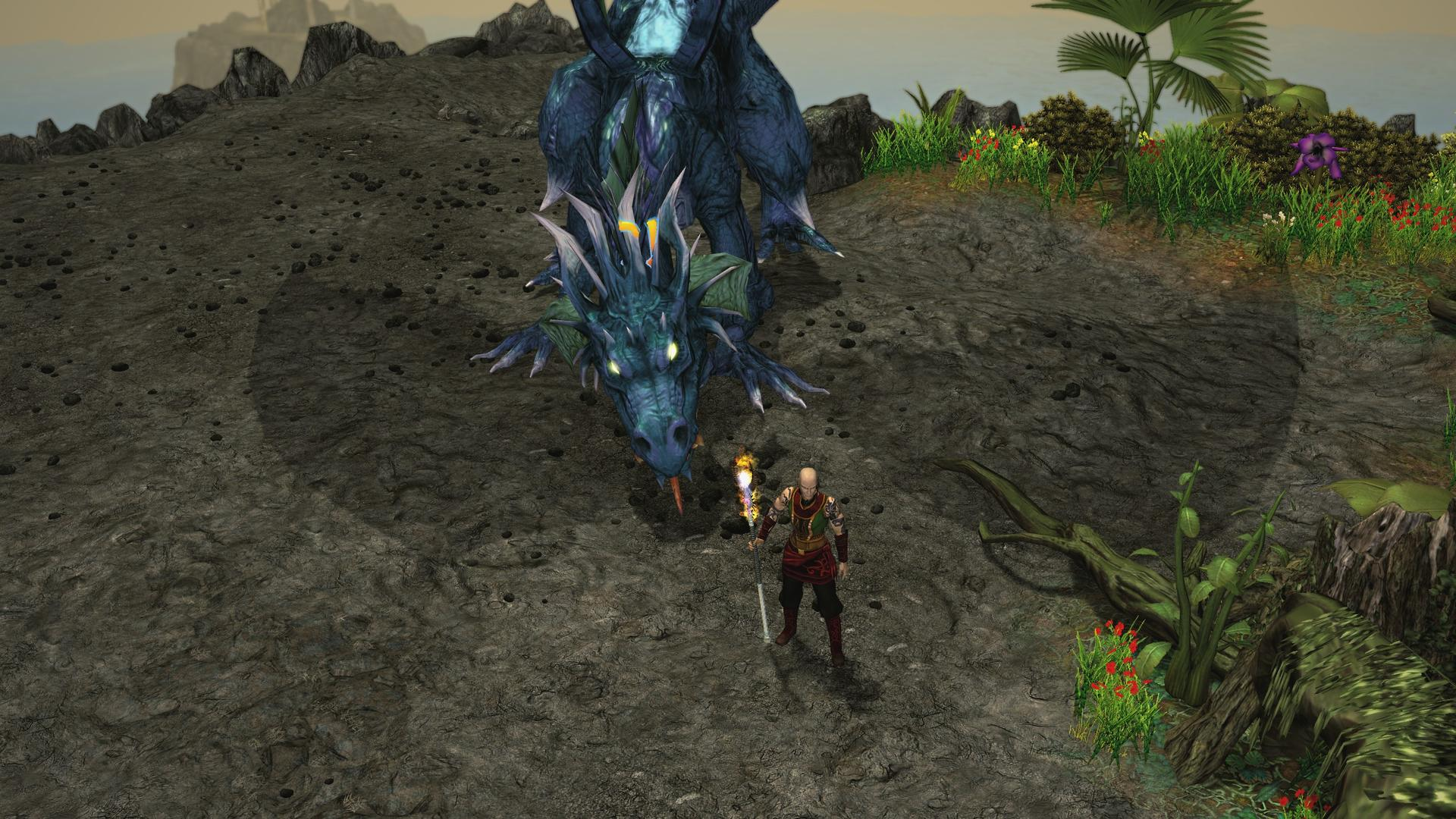 Un guerrier tenant un bâton enflammé se tient devant un grand dragon bleu dans un paysage rocheux.