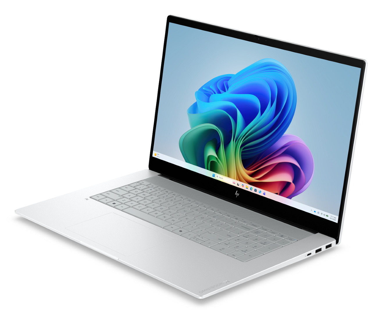 Srebrny laptop HP na czarnym tle, wyświetlający kolorową, abstrakcyjną tapetę.