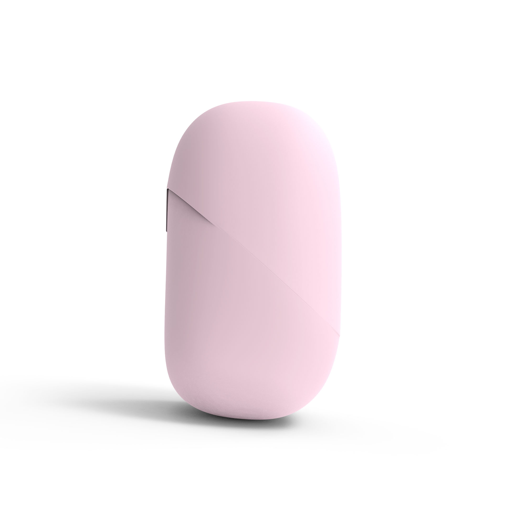 Ein glattes, rosa, pillenförmiges Etui steht auf einer weißen Oberfläche mit einem weichen Schatten.