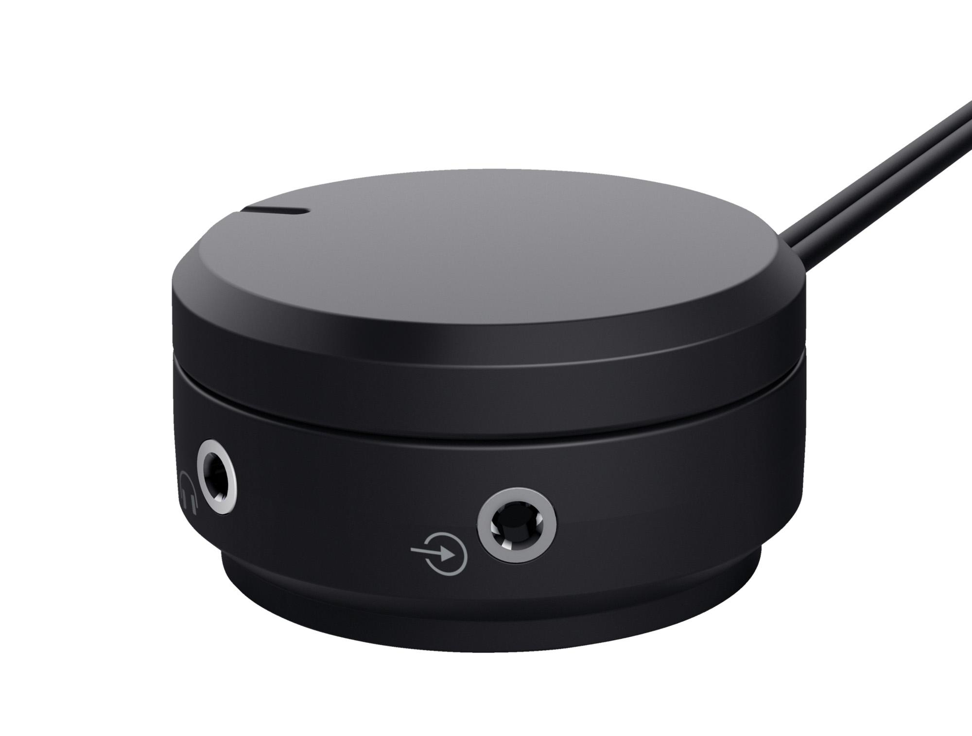 Schwarzer, runder Audio-Controller mit Kabel und zwei Klinkenanschlüssen an der Seite.