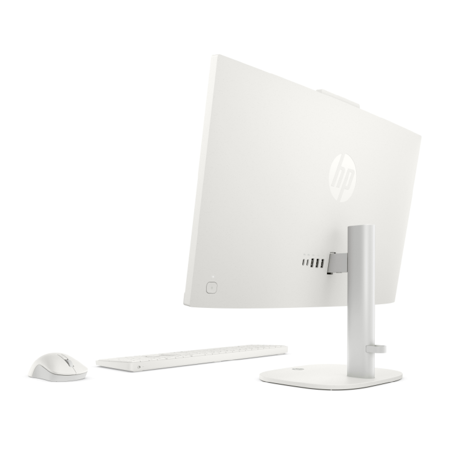 Un ordenador de sobremesa HP todo en uno blanco visto desde atrás, con teclado y ratón a juego en una superficie blanca.
